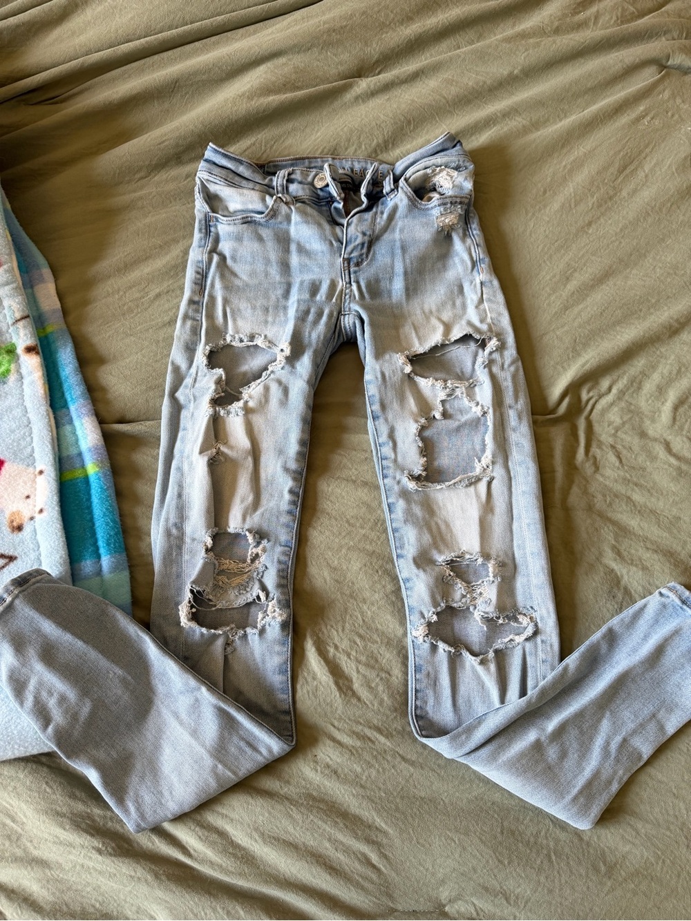 American Eagle Outfitters Light Blue Ripped Skinny Jeans